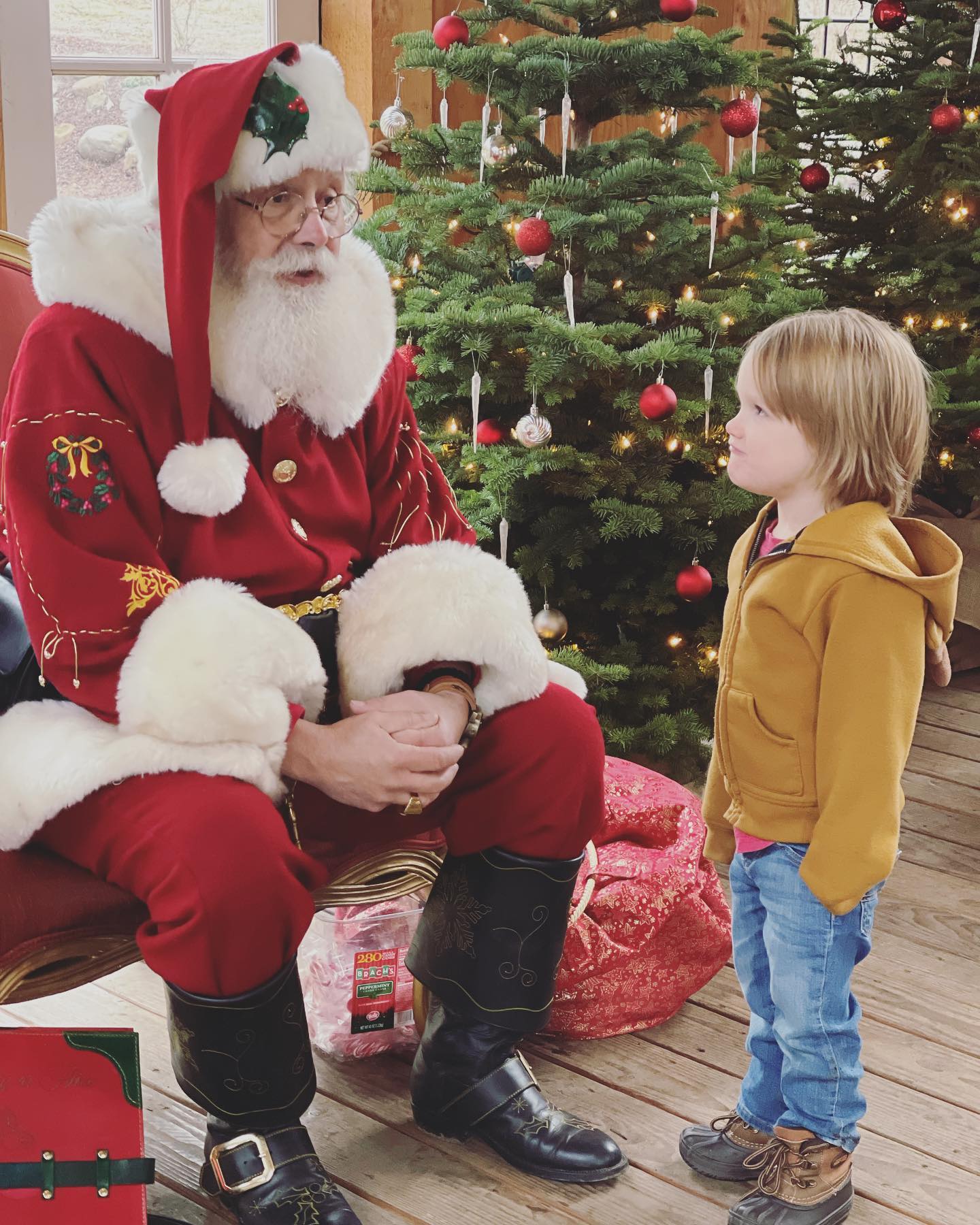 Santa: “So what do you want for Christmas?” Pax: “a gun!” *Audible gasps from the mothers in line behind us* Just another day in the life.